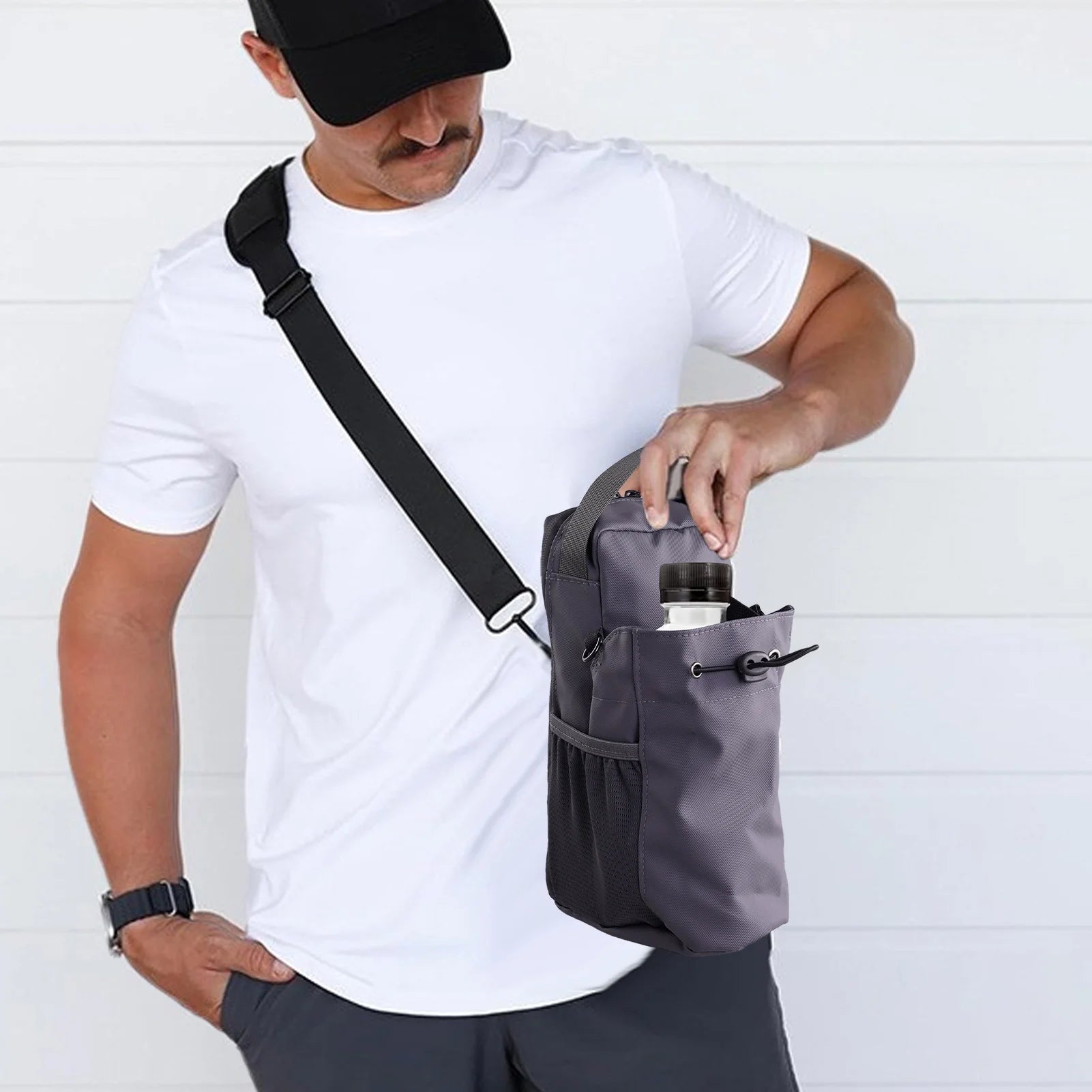 This waterproof magnetic gym sling bag holds your water bottle and phone, making it perfect for outdoor sports, travel, and fitness activities.